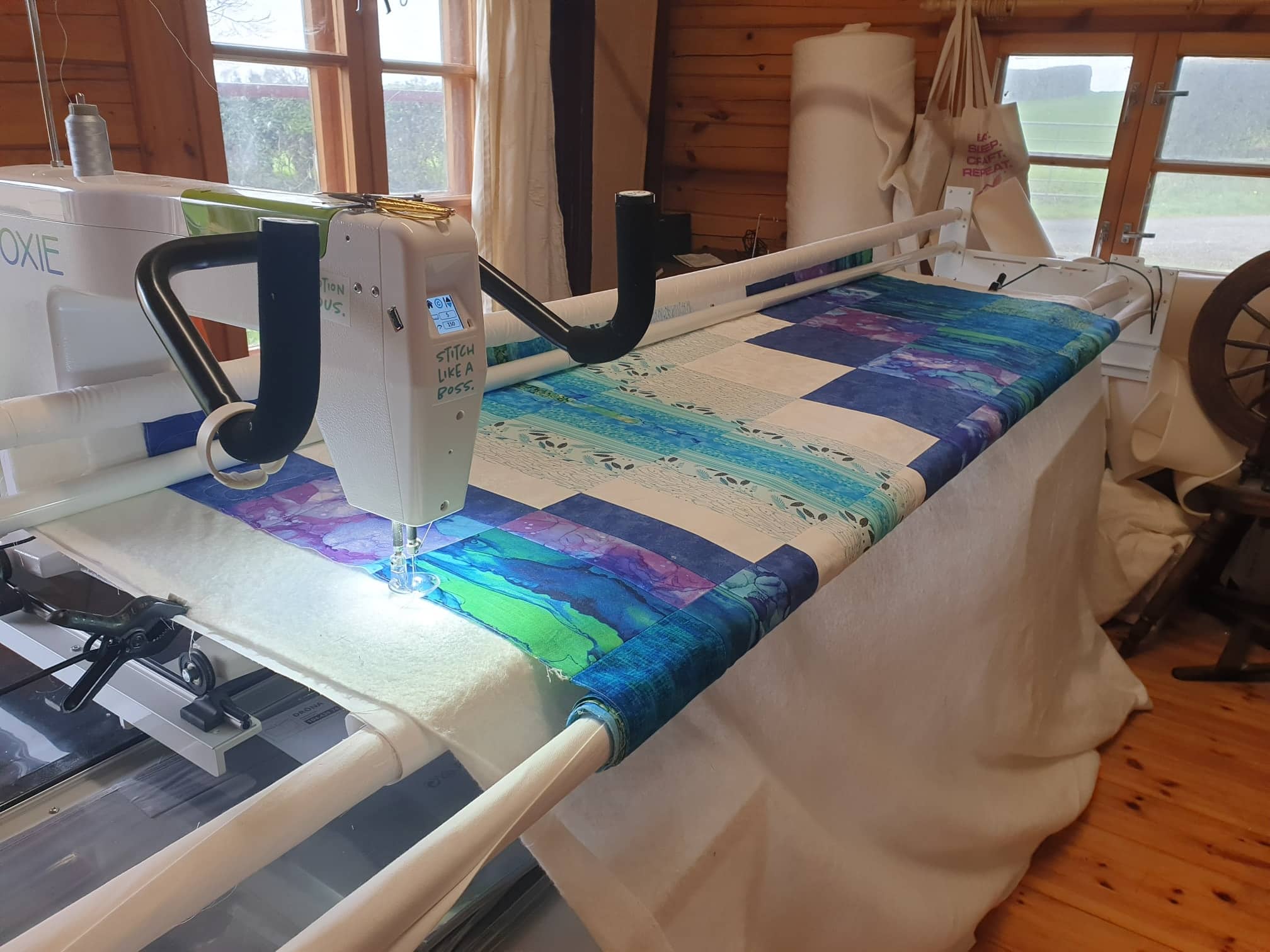 Handi Longarm Quilting Moxie machine on a 10FT frame.